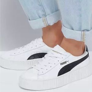 Size 6 Rihanna Puma leather sneakers. NWOT. 1 inch platform.